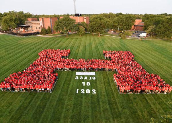 New students form a massive “H” on the campus green
